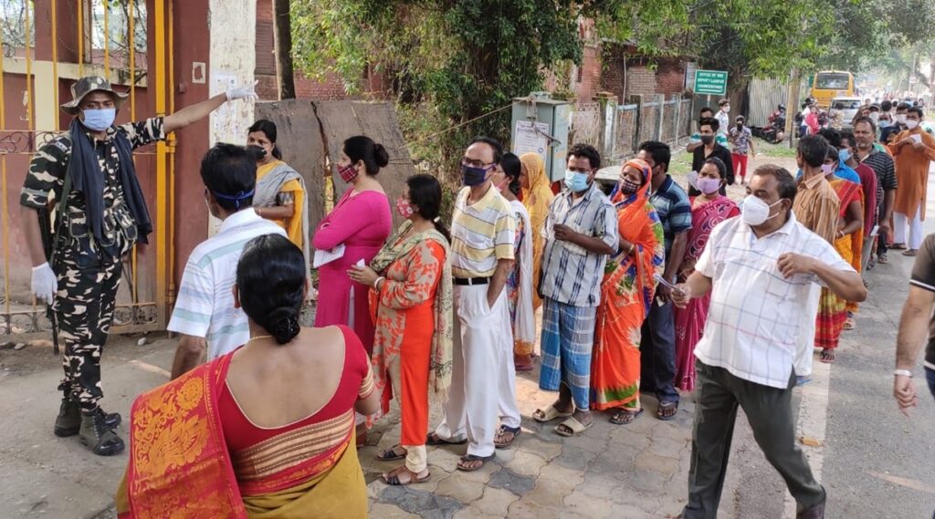 West Bengal Election 2026: High Turnout, Violence and Voter Disputes Shape a Crucial Contest 1 Voters standing in line during West Bengal Election 2026 Phase 1 voting